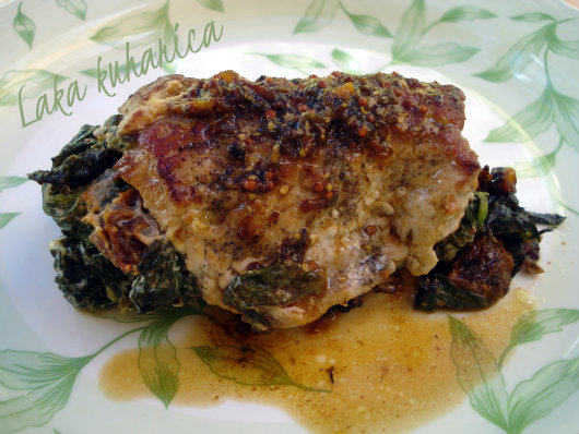 Pork chops stuffed with tomatoes and spinach